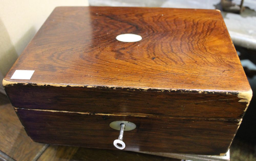 Antique wooden box converted into sewing box