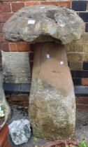 A tall sandstone staddle stone, 102cm high (with cap)