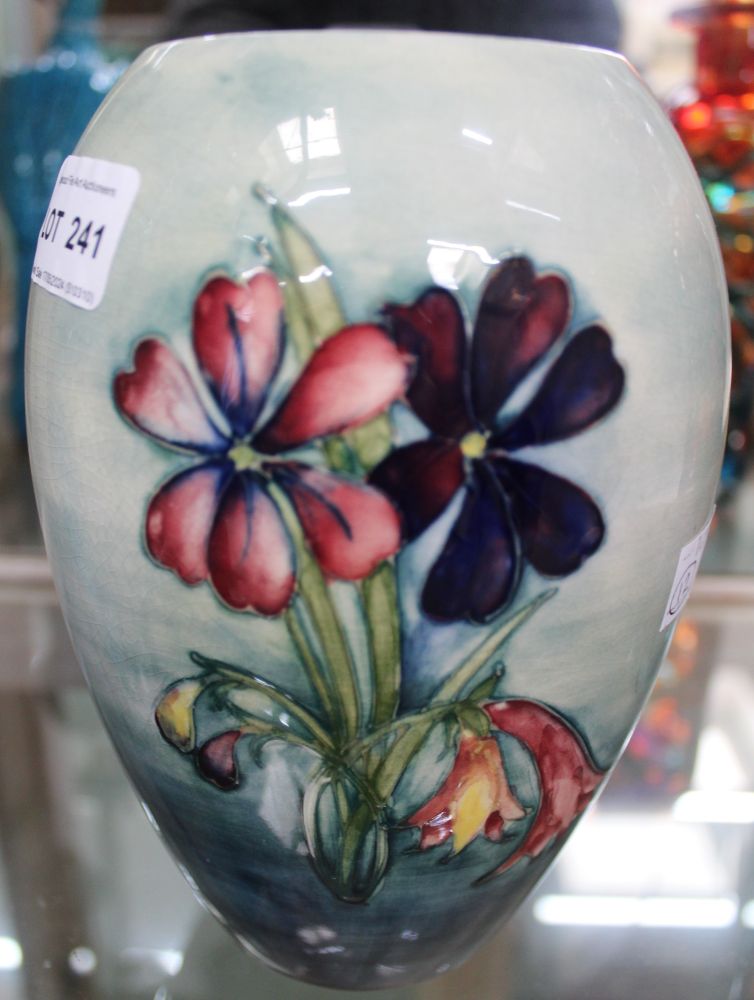 A Moorcroft vase, tube lined and hand painted Lily decoration, painted and impressed factory marks t - Image 2 of 2