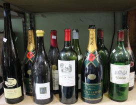 10 empty magnum wine bottles including Chateau Mouton-Rothschild 1966, Moët & Chandon 1990 and Laure
