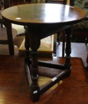 An oak reproduction cricket table of small proportions