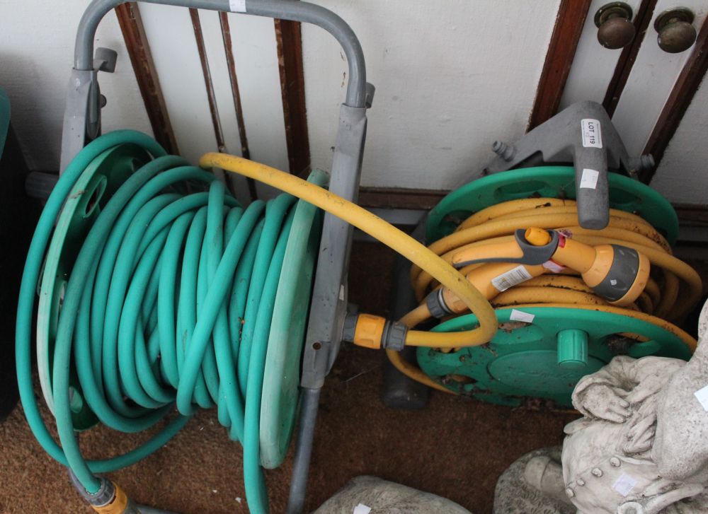 Two garden hoses on reels