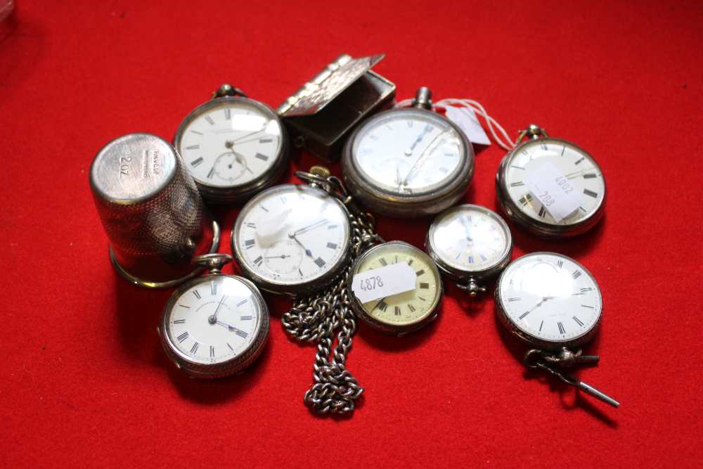 A box containing a selection of silver pocket watches & chain