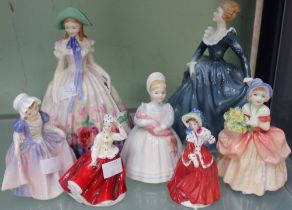 A Royal Doulton bone china figure "Easter Day" HN2039, together with other Royal Doulton figurines (