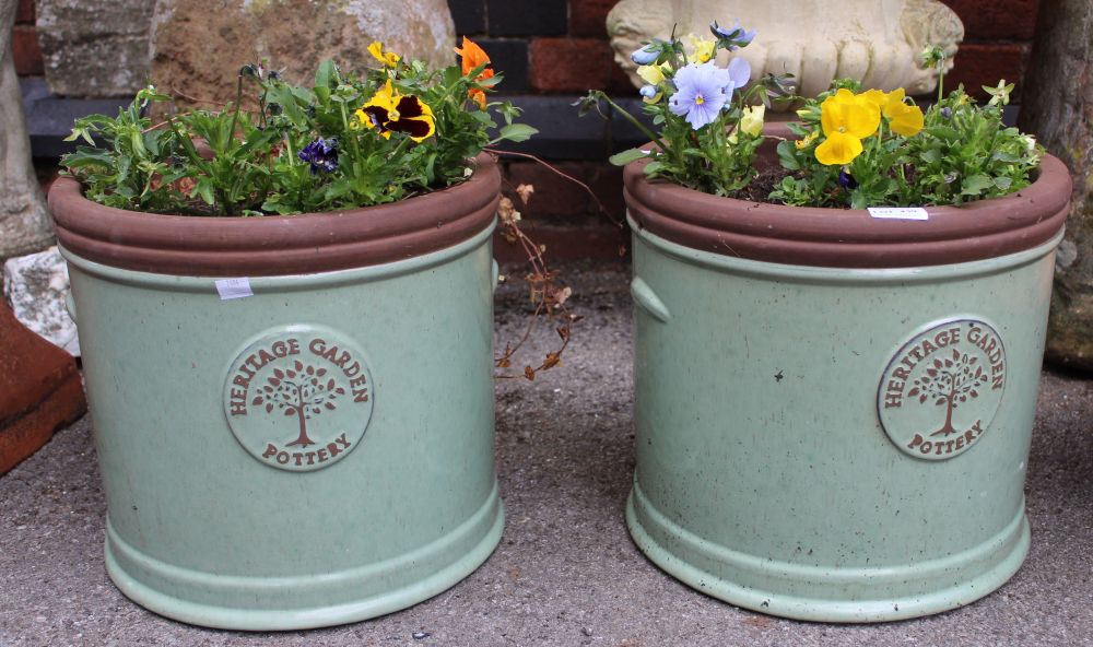 A pair of Heritage Garden Pottery green glazed planters, 33cm high x 36cm