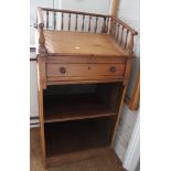 A 19th century pine clerks desk with lift up lid and single drawer, gallery back