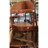 An Edwardian mahogany corner wash stand with single drawer to under tier