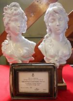 A pair of Royal Worcester porcelain busts "Night and Day" modelled by Arnold Machin O.B.E, R.A., rai