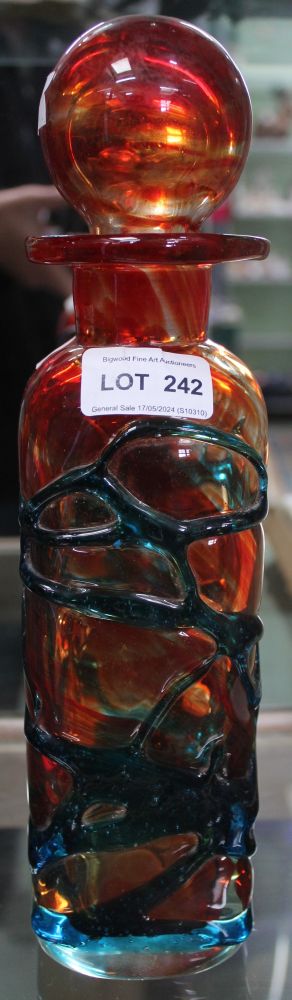 A Mdina Maltese orange ground glass bottle with stopper, 30cm high