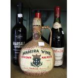 A bottle of Chateaneuf du Pap 1978, bottle of Tia Maria, bottle of Madeira Wine and