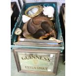 A tray containing a selection of collectible items including shells, glassware, a Guinness mirror