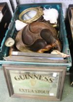 A tray containing a selection of collectible items including shells, glassware, a Guinness mirror