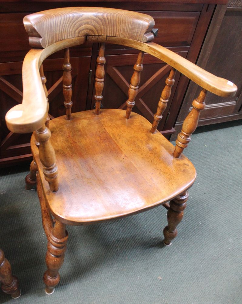 Early 20th century Windsor comb back smokers bow elbow chair