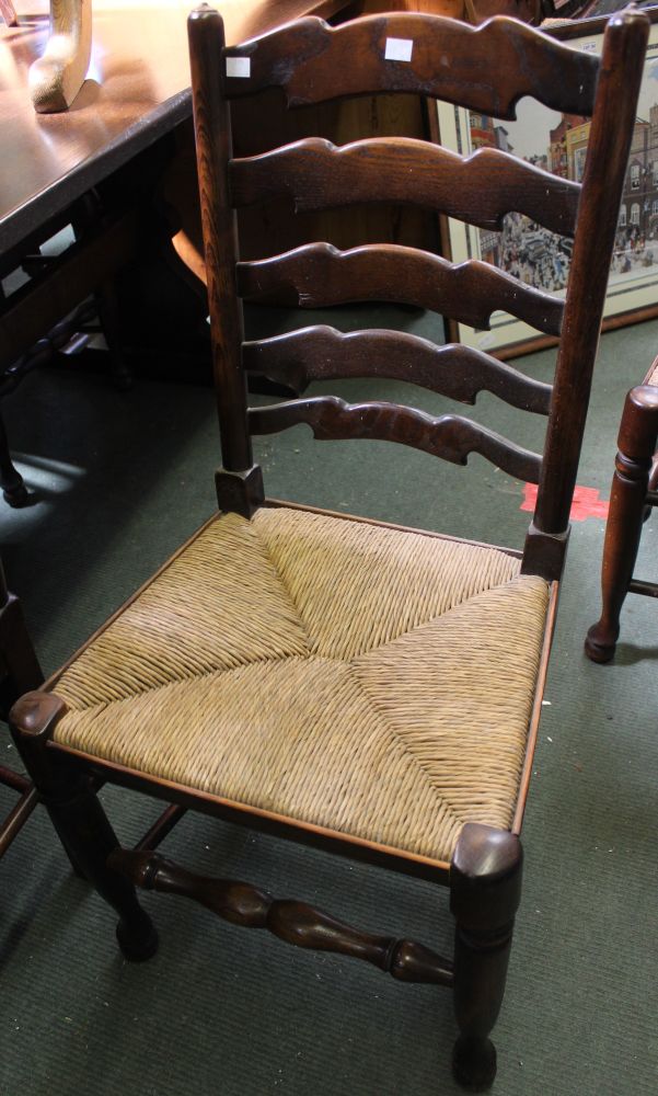 A set of eight ladder back rush seated dining chairs to include two carvers - Image 2 of 2