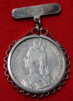 A Victorian silver crown 1889, in a brooch mount, gross weight 39g