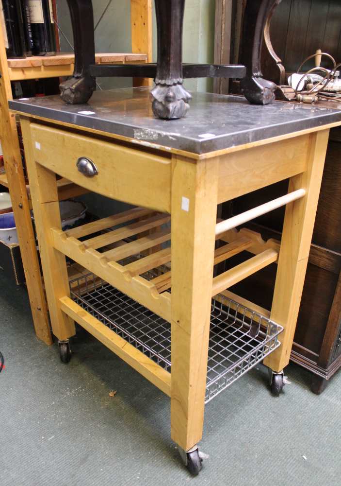 A modern metal topped beech mobile kitchen trolley