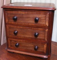 An oak banded miniature three drawer chest possible apprentice piece 27 x 29 cm