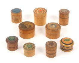 Nine various whitewood Tunbridge ware cylinder boxes, mostly with ring painted decoration, five with