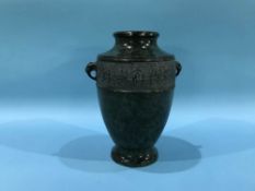 A modern oriental metalware vase
