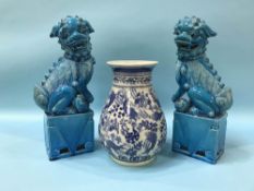 A modern Chinese vase and a pair of dogs of Fo