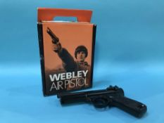 A boxed Webley premier MKII air pistol