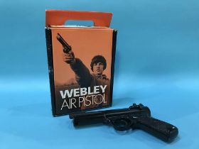 A boxed Webley premier MKII air pistol