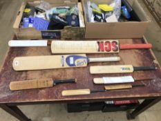 Collection of signed cricket bats etc.