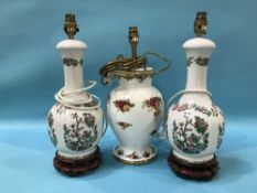 A Royal Albert Old Country Roses table lamp and a pair of table lamps