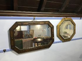 Brass mirror and an oak mirror
