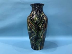 A tall pottery vase with incised decoration of birds, H 50cm