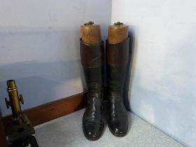 A pair of leather riding boots