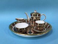 A Royal Crown Derby Imari pattern, number 1128, miniature Bachelors tea set
