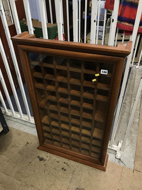 A glazed wall cabinet