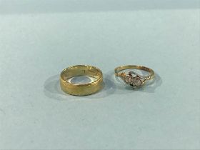 Two 18t gold rings, 7.4g