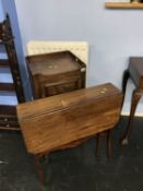A mahogany Sutherland table and a bedside cabinet