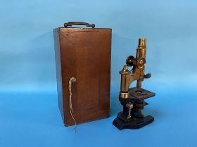 A cased microscope