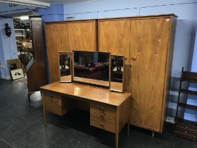 Two Butilux teak wardrobes and teak dressing table