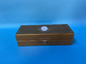 A boxed bottle of 2002 Louis Roederer Cristal Champagne