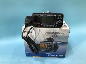 A boxed I-Com IC-M323G VHF marine transceiver