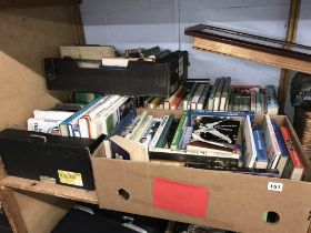 Four boxes of cricket books