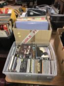 Two boxes of assorted CD's etc