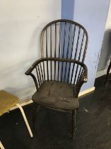 A stick back Windsor chair