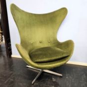 A green upholstered 'Egg chair' by Arne Jacobsen for Fritz Hansen, purchased from Adrian Share