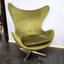 A green upholstered 'Egg chair' by Arne Jacobsen for Fritz Hansen, purchased from Adrian Share