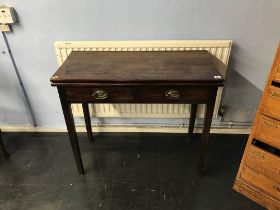 A Georgian mahogany foldover tea table with two drawers, W 85cm