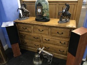 A pine chest of drawers