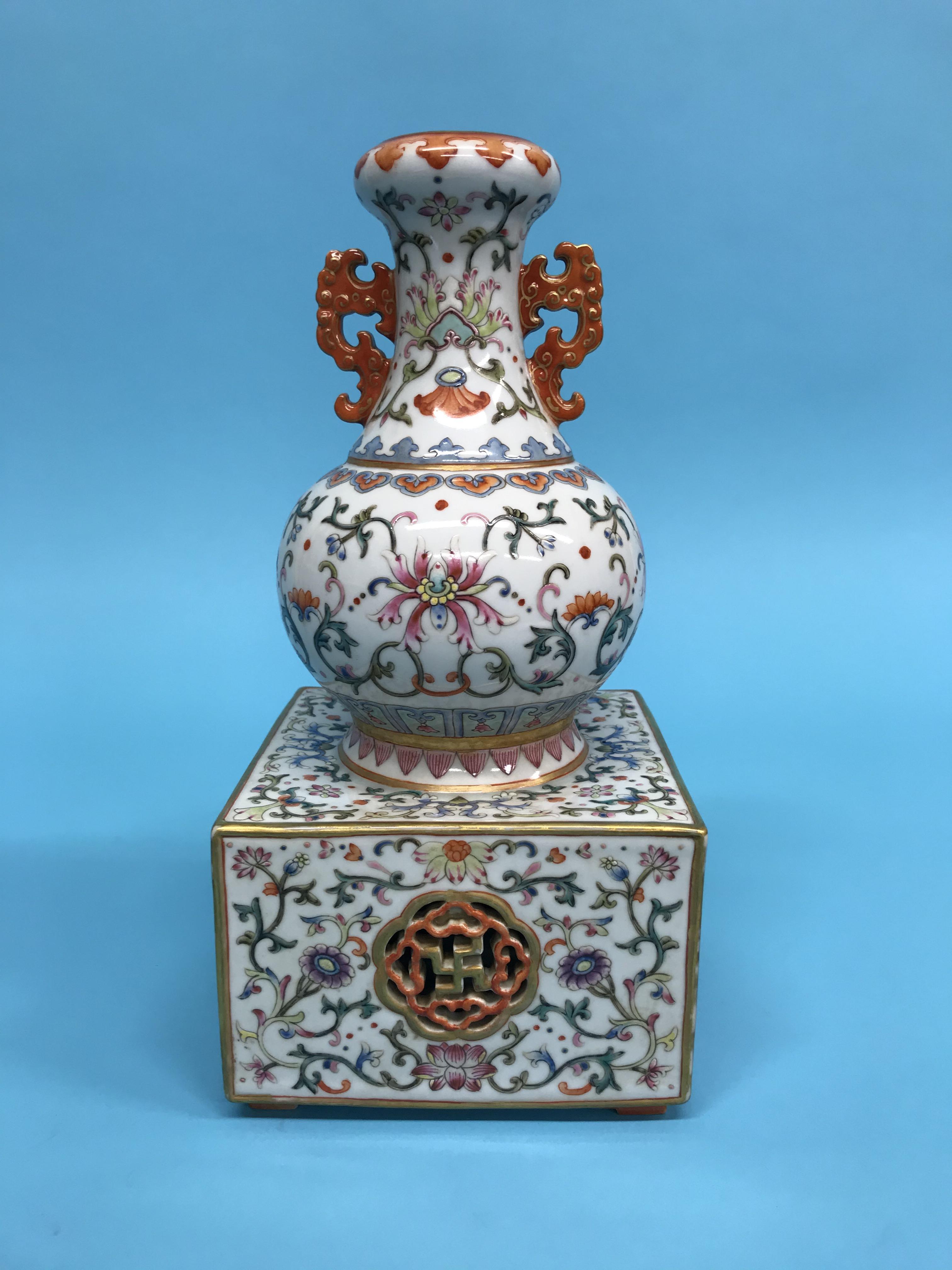 An unusual Chinese Famille Rose two handled vase, supported on a square and pierced base, mark in - Image 10 of 17