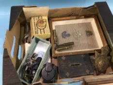 Collection of assorted Militaria, including Cap badges, dog tags, a compass etc