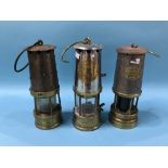 Three miners lamps