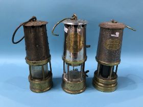 Three miners lamps